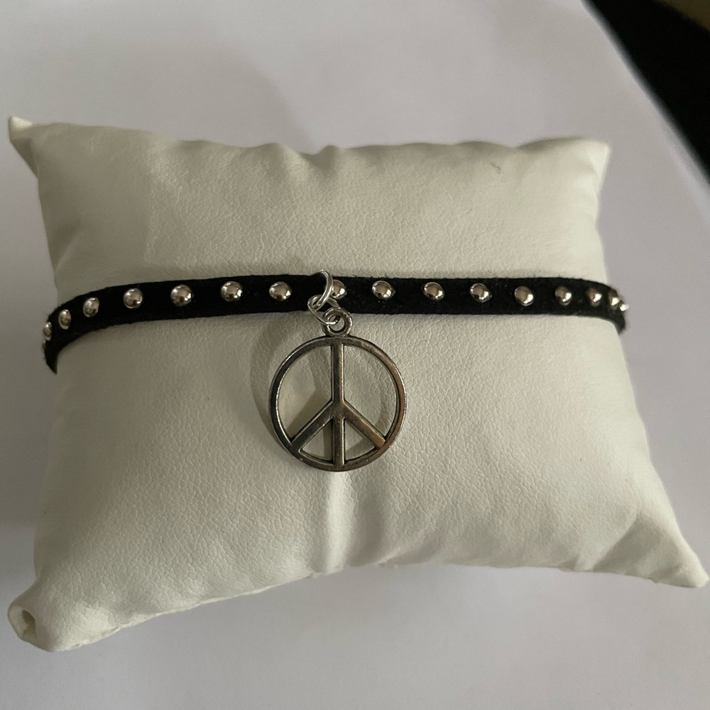 Black Bracelet with Silver Peace Pendant